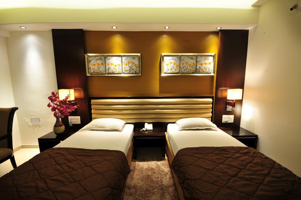 Hotel Surabhi Regency Ānand Værelse billede